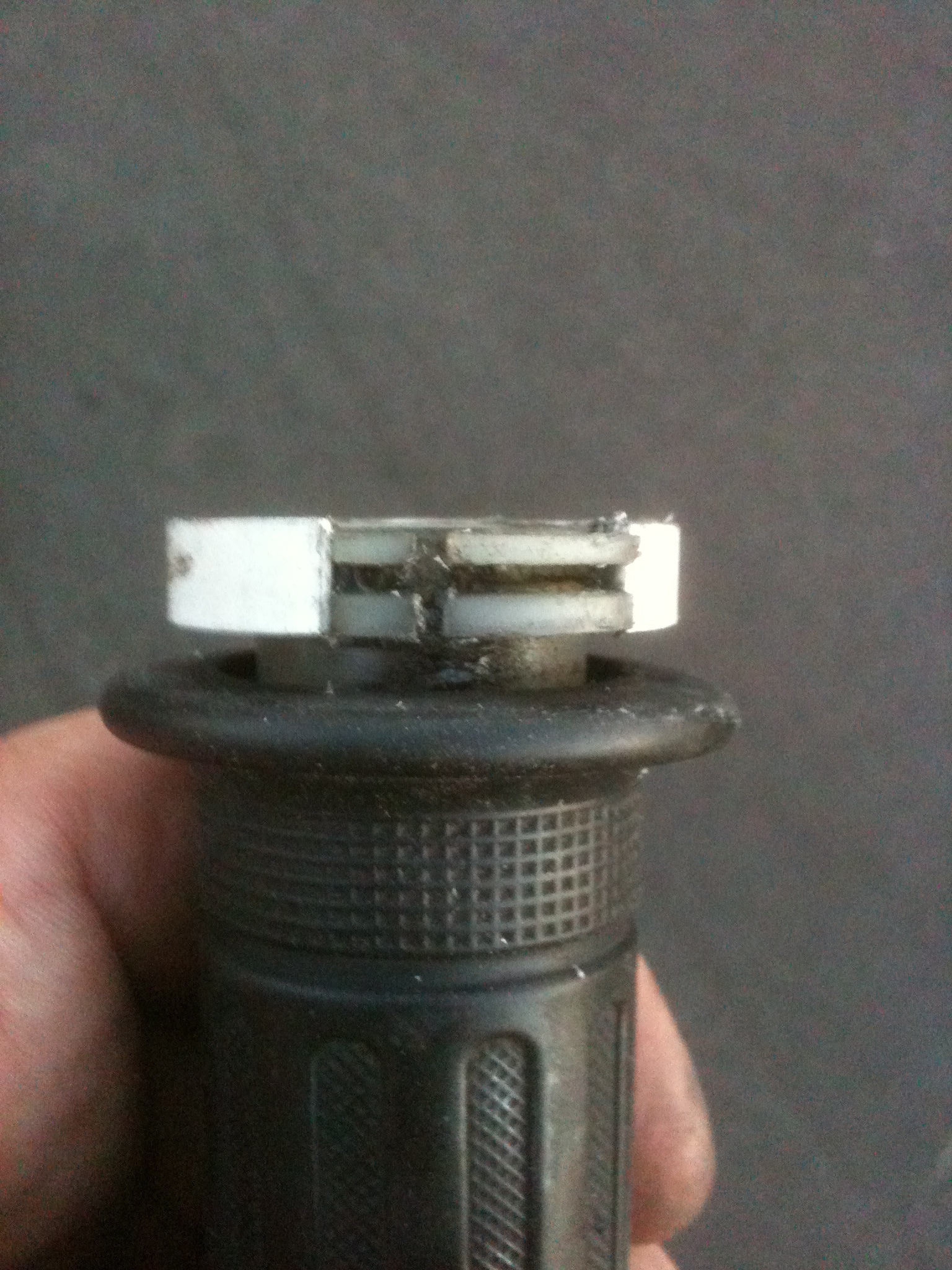 A thin slice of pvc fitted into the groove for the cable worked very well